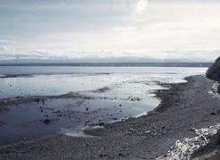 Figure 13. Gravel beach at the south end of Quadra Island. The source of the gravel is the eroding sea cliff that backs the beach. John J. Clague photo